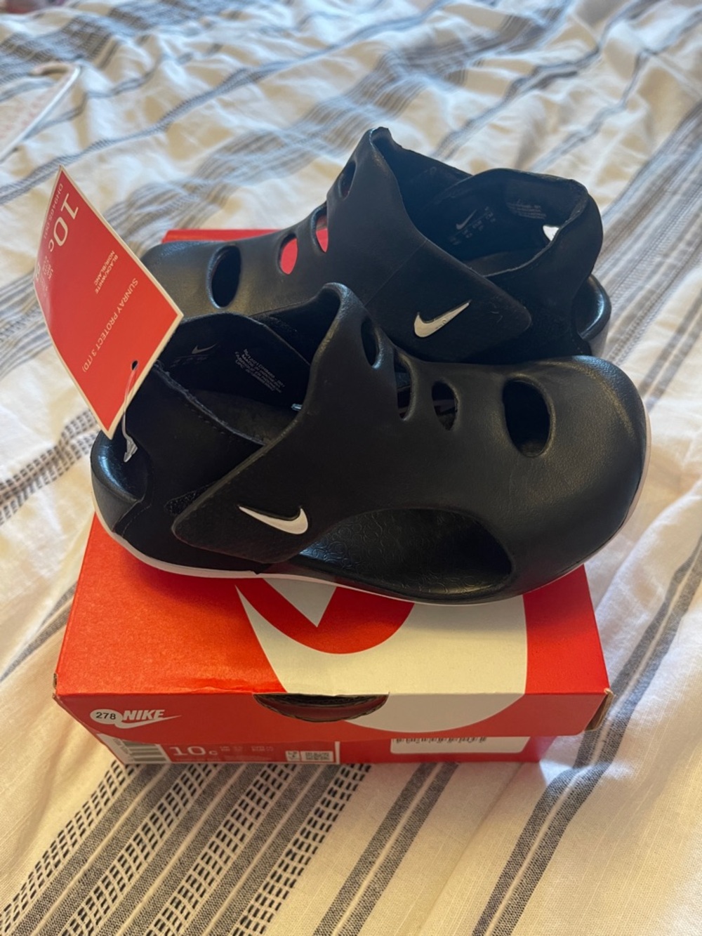 Nike Kids Black Slip-On Water Sandals with White Swoosh